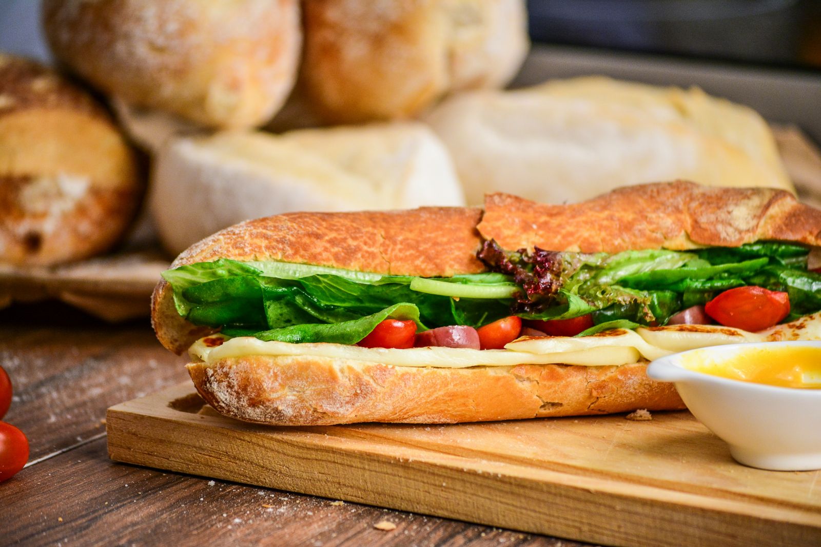 A deli sandwich on a baguette