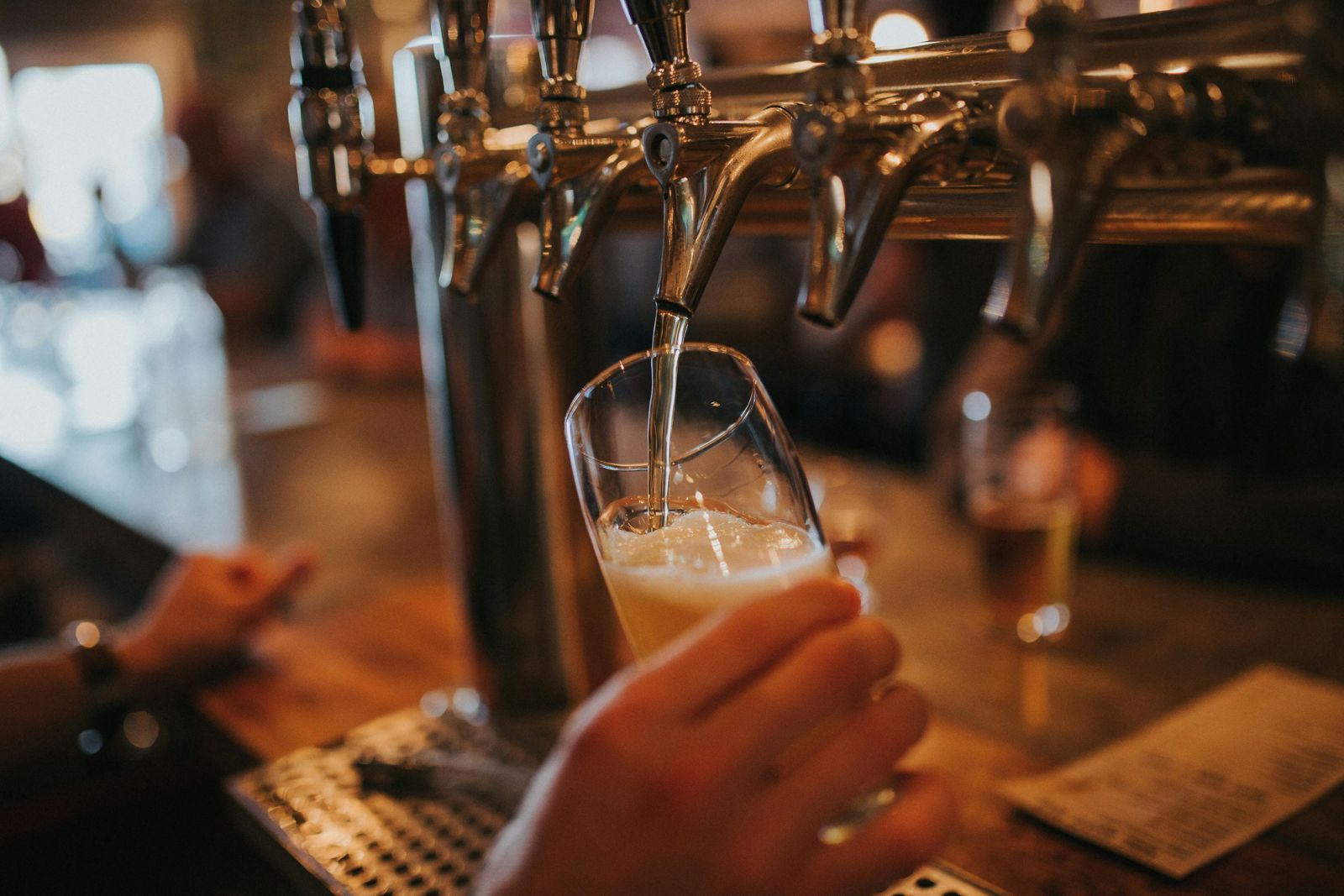 Beer pouring from a tap